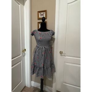 Louvis black and white striped midi dress with red lip accents